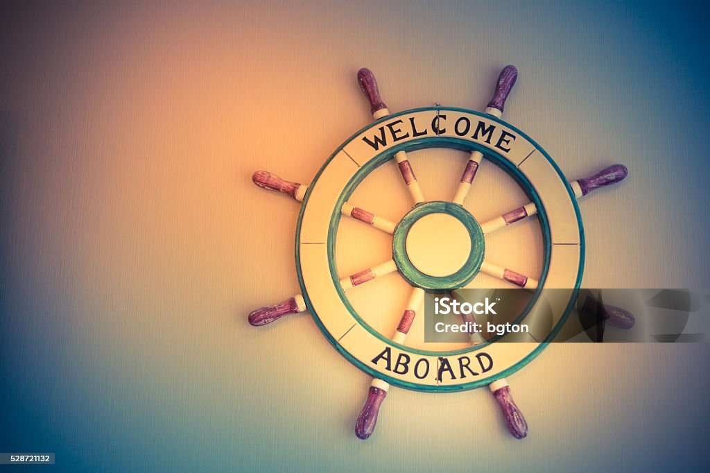 Ship steering wheel Ship steering wheel,interior on wall Driving Stock Photo