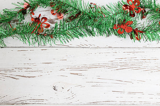 istock christmas decoration on white wood weathered background 528722841