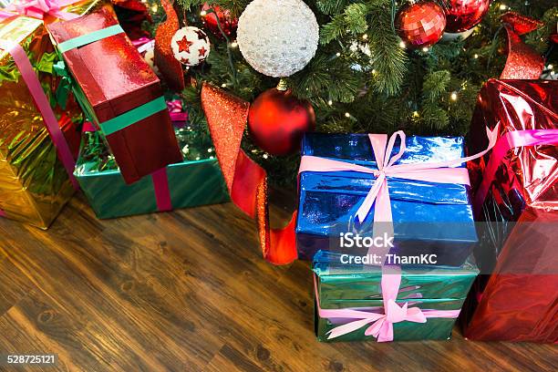 Christmas Presents And Gifts Under The Tree Stock Photo - Download Image Now - Blue, Bright, Celebration