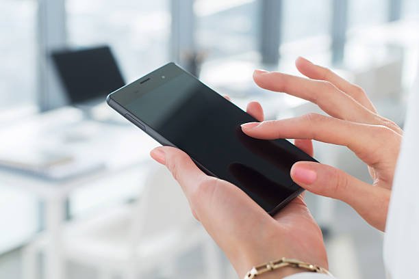 istock Woman using her digital device, reading news, sending sms, surfing 528726032