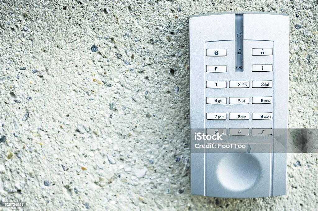 modern keypad closeup of a modern keypad Building Entrance Stock Photo