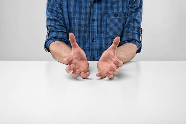 istock Masculine hands showing the size of something 528726598