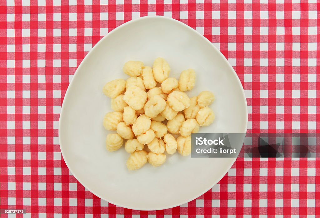 Gnocchi plate on Red and white checkered table Gnocchi Stock Photo