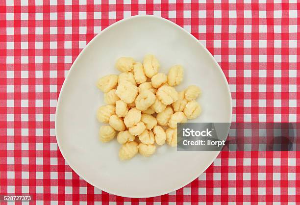 Gnocchi Plate On Red And White Checkered Table Stock Photo - Download Image Now - Gnocchi, Savory Sauce, Backgrounds