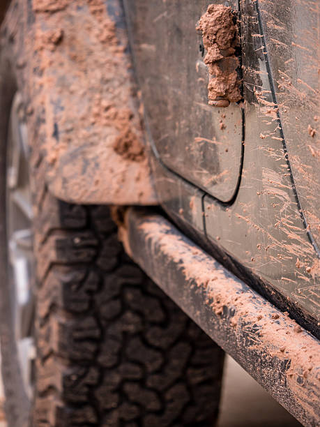 istock Muddy Off Road Vehicle Closeup 528728404