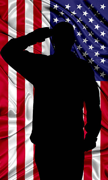 istock Saluting to USA flag 528731394