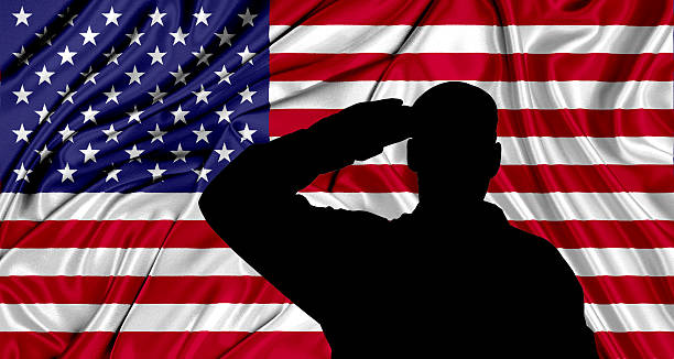 istock Saluting to USA flag 528731406
