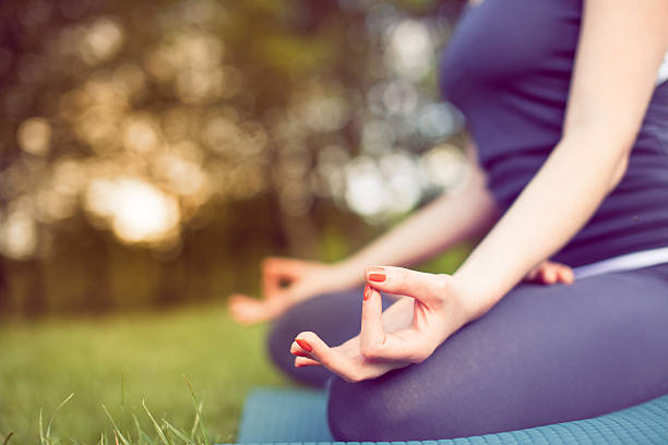 istock Young woman doing yoga 528732598