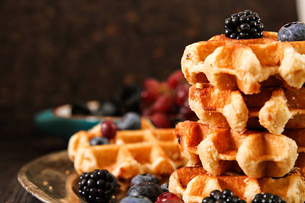 istock Belgian waffles with blueberries and grapes 528733148
