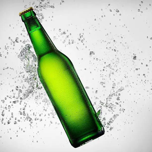 Photo of Beer bottle under water