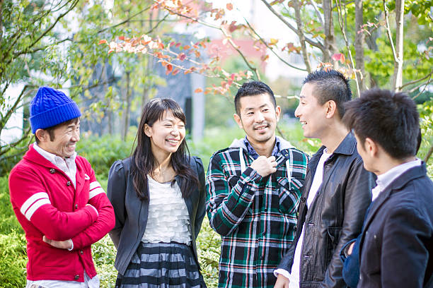 istock Friens chatting at a city park 528737346