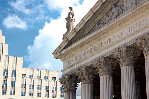 New York State Supreme Court building in Lower Manhattan showing the words \