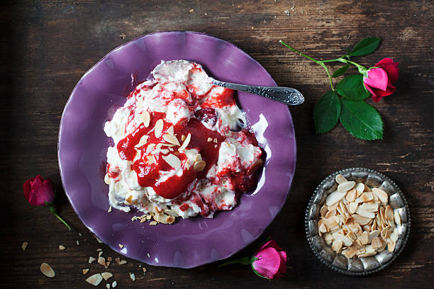 istock Eton Mess with strawberries and rose oil. 528738592