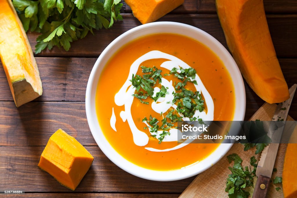 Pumpkin soup Pumpkin soup with the fresh pumpkin and parsley Pumpkin Soup Stock Photo