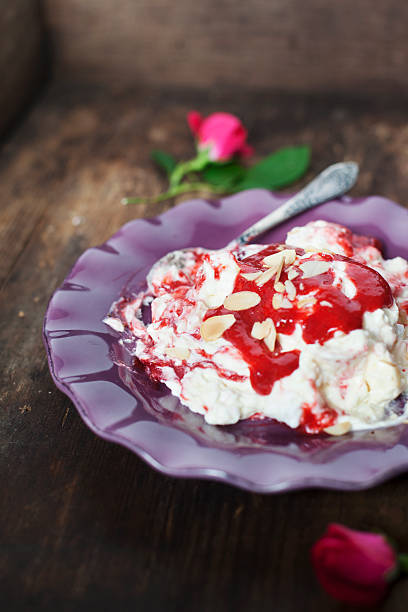 Eton Mess with strawberries and rose oil.