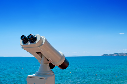 Binoculars overlooking the sea