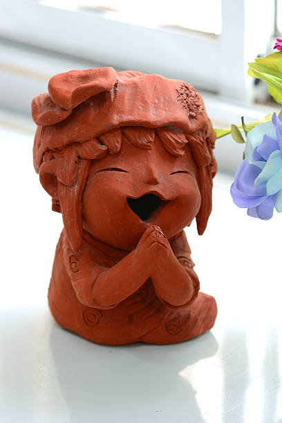 istock Thai boy sculpture paying respect, thai call 