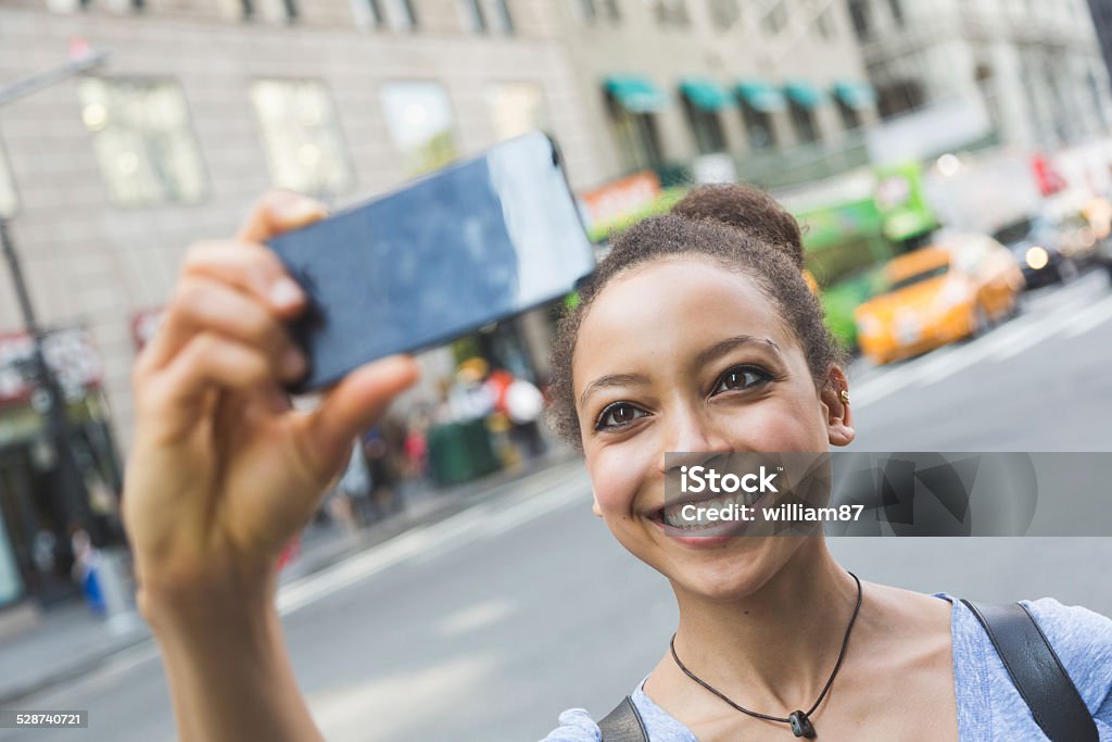 Beautiful Mixed Race Woman Taking Selfie in New York Adult Stock Photo