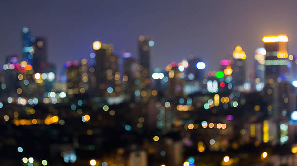 istock Abstract blurred bokeh night view, city lights downtown 528741446