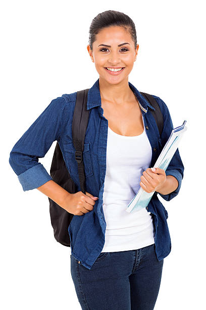 istock college girl holding books 528741735