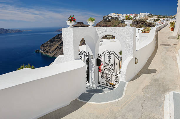 oia luxury decks and patios - santorini door sea gate bildbanksfoton och bilder