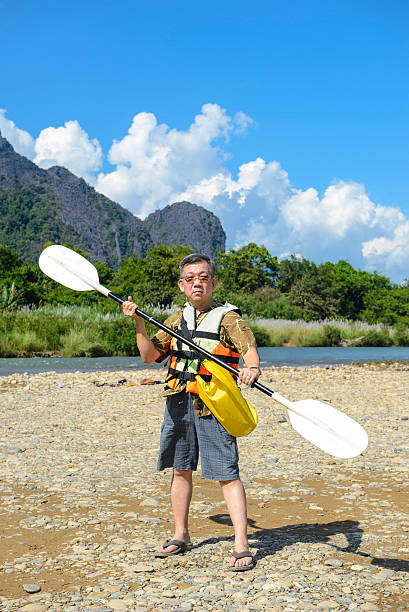istock Tourists holding an oar 528742459