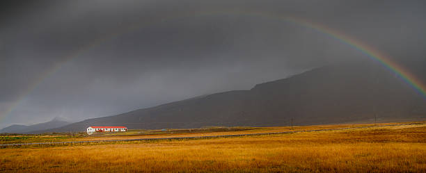 Rainbow over Farm in Iceland stock photo