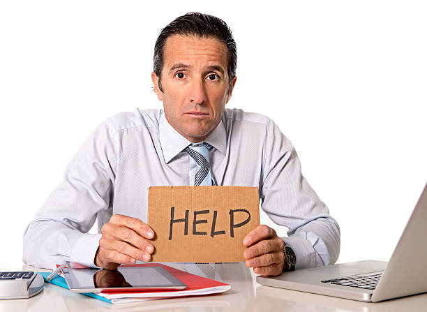 istock senior businessman in crisis working on computer office in stress 528744629