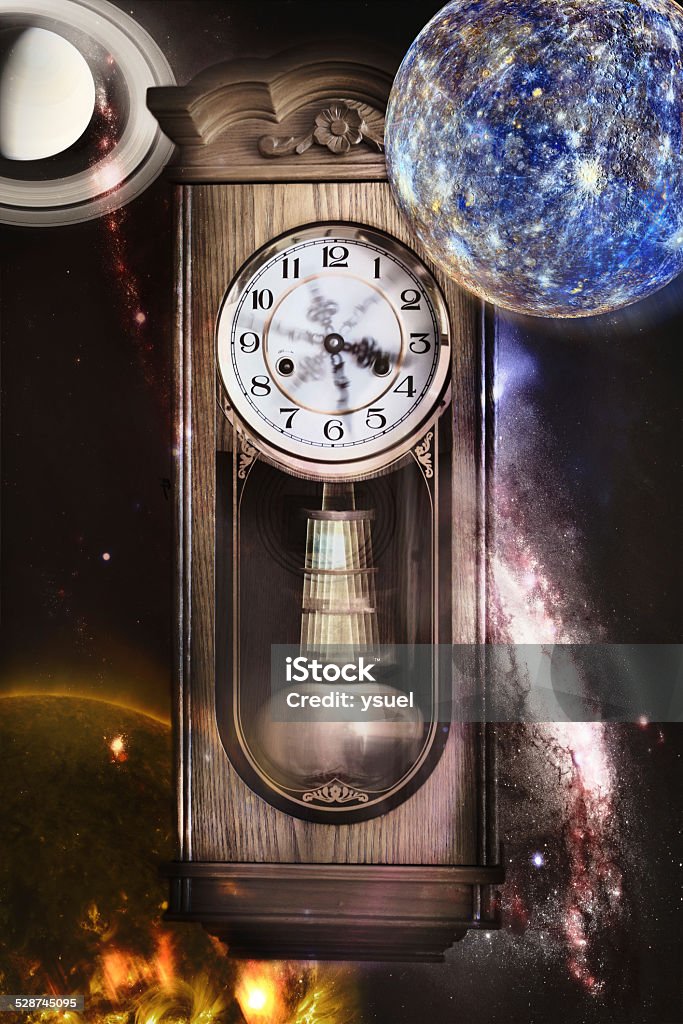 time is running Passing of time. Elements of this image furnished by NASA. Pendulum Stock Photo