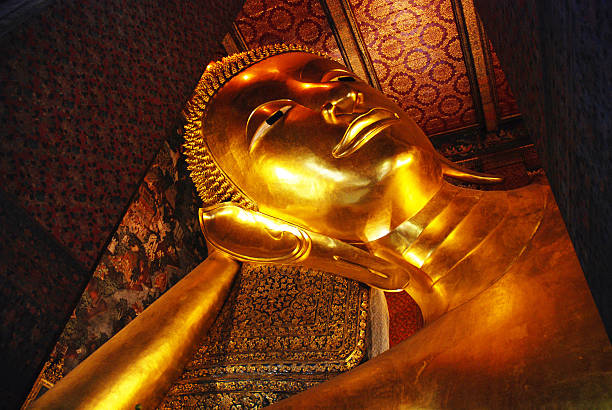 istock Reclining buddha within the Wat Pho in Bangkok Thailand 528768337