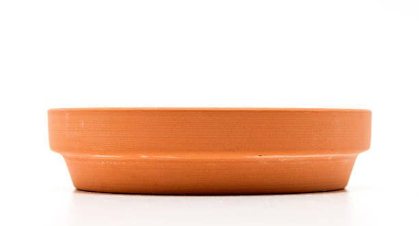 Clay saucer plate isolated on white background
