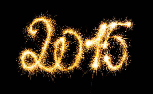 istock Happy New Year - 2015 with sparklers 528777571