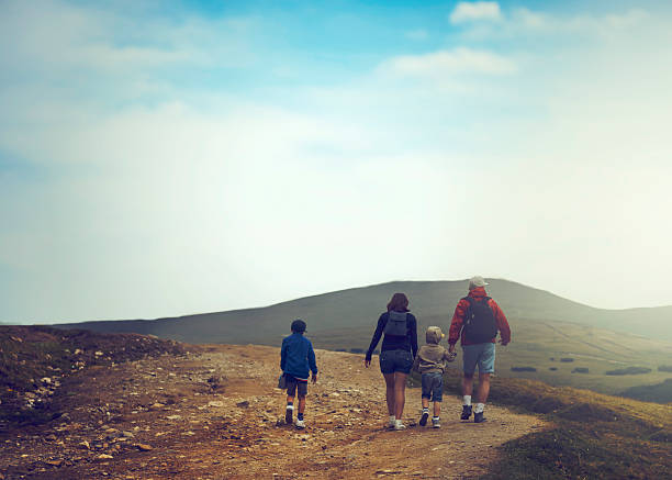 istock family on mountain trip 528777893