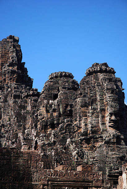 istock Ancient statue in Angkor / Bayon temple /  Cambodia 528778349