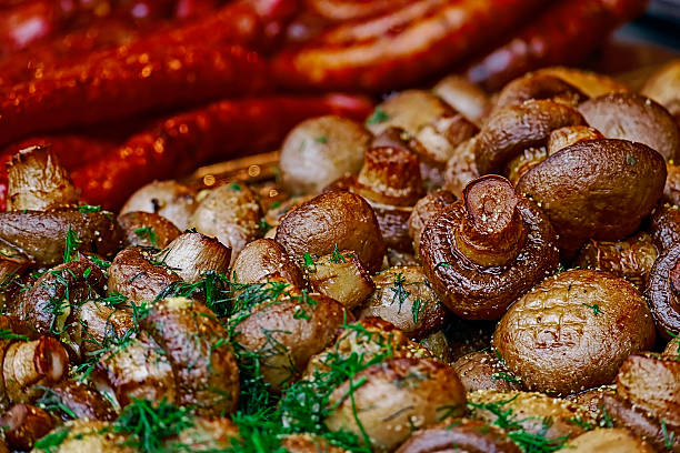 istock Mushrooms and fried sausages 528778767