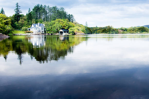 istock Lake house with mirrored background. 528779339