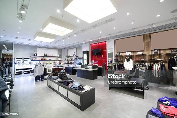 Brand New Interior Of Cloth Store Stock Photo - Download Image Now - Lighting Equipment, Store, Retail