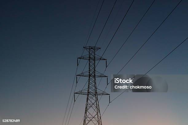 High Voltage Stock Photo - Download Image Now - Back Lit, Built Structure, Cable