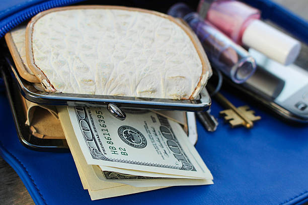 istock Blue women's purse. Things from open lady hand bag. 528791931
