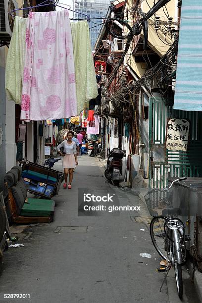 Shanghai Old Town Shikumen Street Scene Stock Photo - Download Image Now - Bicycle, Cable, China - East Asia