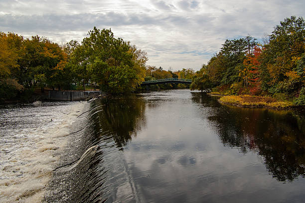 Water flows over the Watertown Dam