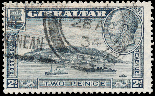 GIBRALTAR - CIRCA 1931: A stamp printed in GIBRALTAR shows image of the George V was King of the United Kingdom and the Dominions of the British Commonwealth, circa 1931.