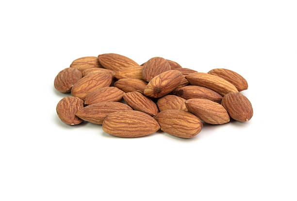 istock Handful almond isolated on a white background 528826597