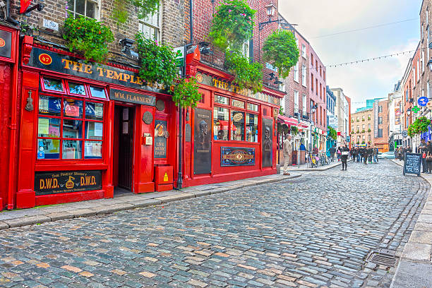 The Temple Bar Dublin, Ireland - Oct 19, 2014: People around The Temple Bar in Dublin, Ireland on October 19, 2014 guinness photos stock pictures, royalty-free photos & images