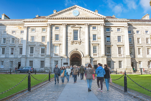 Dublin, Ireland - Oct 25, 2014: People at Trinity College yard in Dublin, Ireland on October 25, 2014