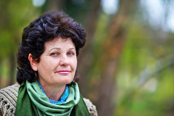 istock woman in park 528829197