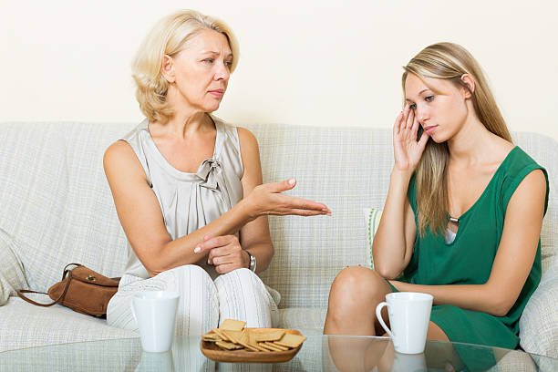 istock daughter and mature mother having serious talking 528862969