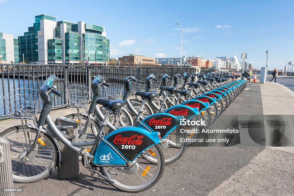 Dublin Bikes Dublin, Ireland - Oct 25, 2014: Dublin bikes with the Cocacola zero sponsor at the Liffey river in Dublin, Ireland on October 25, 2014 Bicycle Stock Photo