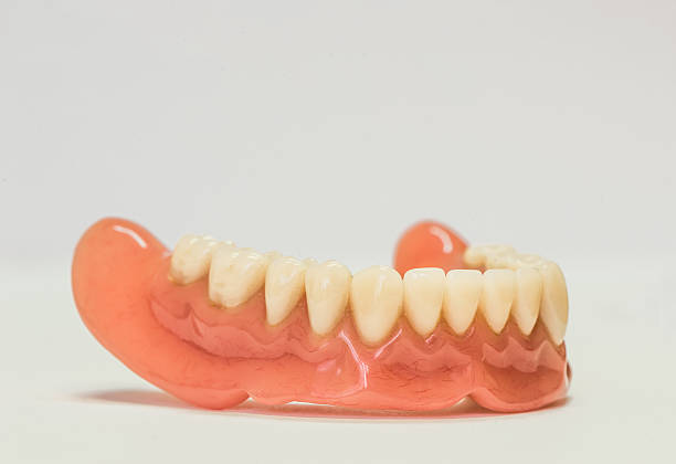 istock Dental dentures isolated on white 528867129