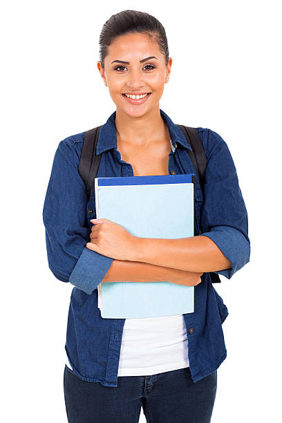 istock female college student holding books 528873795